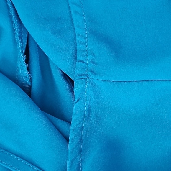 Elle Turquoise Sleeveless Blouse with Ruffles and Pleated Front - Picture 11 of 15